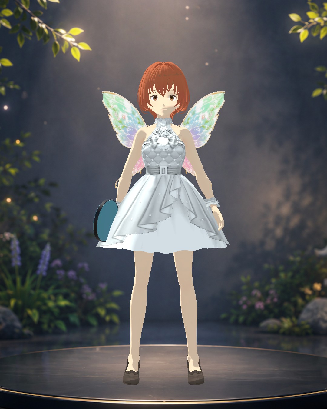 A silver party dress with fairy wings, in the Character Studio